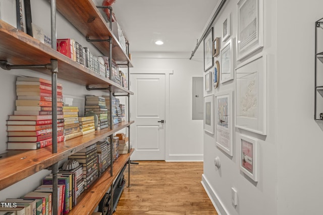 1535 Caraleigh Mills Ct Unit 210, Raleigh, NC 27603 - hallway featuring light wood-style flooring, recessed lighting, and electric panel