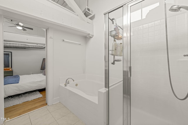1535 Caraleigh Mills Ct Unit 210, Raleigh, NC 27603 - bathroom with a shower stall, a garden tub, tile patterned floors, and ensuite bathroom