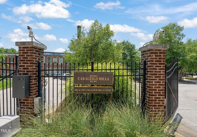 1535 Caraleigh Mills Ct Unit 210, Raleigh, NC 27603 - community sign with a gate