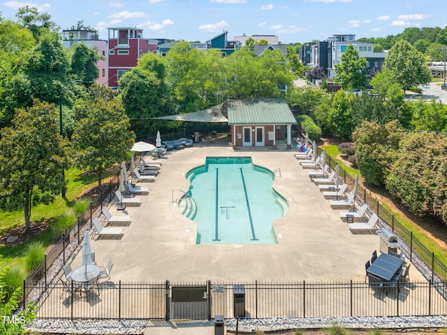 1535 Caraleigh Mills Ct Unit 210, Raleigh, NC 27603 - community pool featuring a patio area and an outbuilding