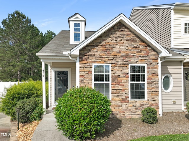 1375 Quail Cir, Creedmoor, NC 27522 - view of front of property with stone siding and roof with shingles