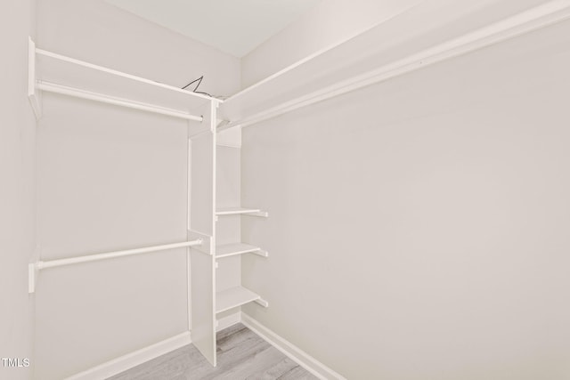1375 Quail Cir, Creedmoor, NC 27522 - walk in closet featuring wood finished floors