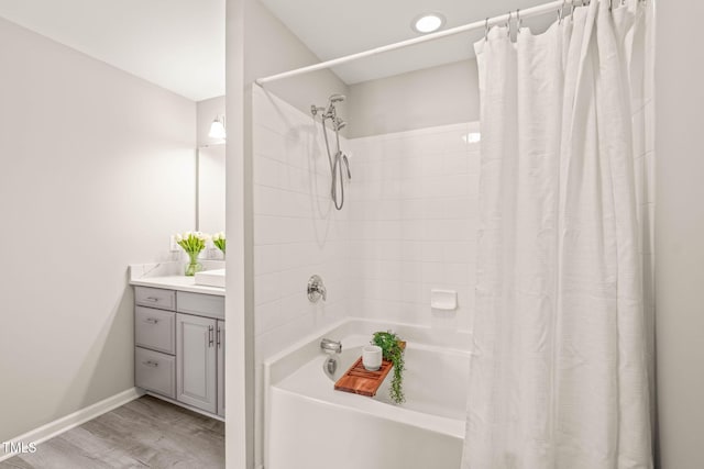 1375 Quail Cir, Creedmoor, NC 27522 - full bathroom with shower / bath combo, vanity, and wood finished floors