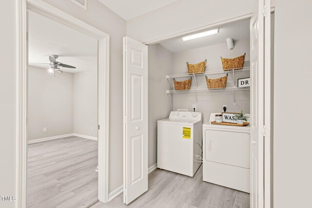 1375 Quail Cir, Creedmoor, NC 27522 - washroom with light wood-style flooring, independent washer and dryer, a ceiling fan, and baseboards