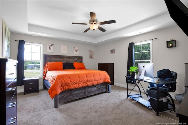 405 Shelton Beard Rd, Stedman, NC 28391 - bedroom featuring a tray ceiling, a desk, carpet floors, and ceiling fan