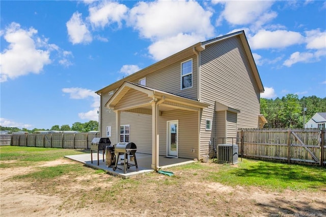 405 Shelton Beard Rd, Stedman, NC 28391 - rear view of house featuring a patio and central AC unit