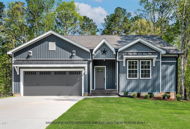 154 Buckaroo Dr, Louisburg, NC 27549 - view of front facade with a standing seam roof, driveway, a garage, roof with shingles, and board and batten siding