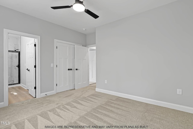 154 Buckaroo Dr, Louisburg, NC 27549 - unfurnished bedroom featuring carpet flooring, baseboards, ensuite bathroom, and a ceiling fan