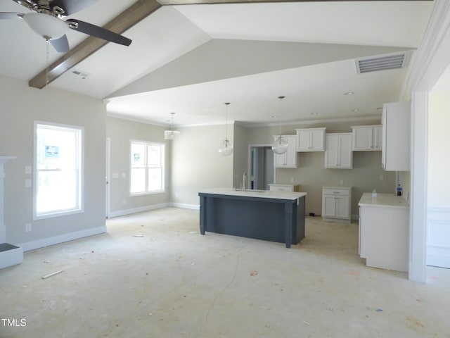 788 Shade Tree Rd, Benson, NC 27504 - kitchen featuring white cabinets, vaulted ceiling, a sink, ceiling fan, and pendant lighting
