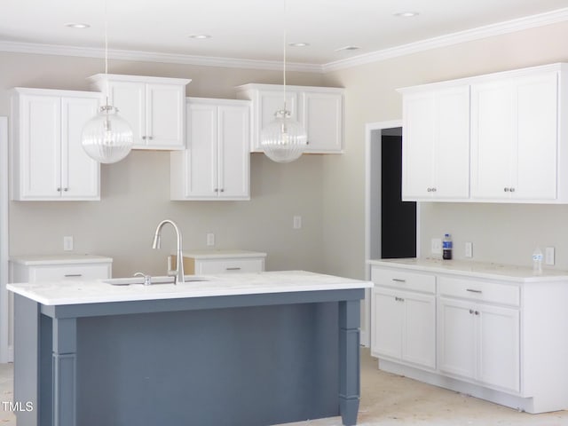 788 Shade Tree Rd, Benson, NC 27504 - kitchen with a sink, an island with sink, white cabinetry, hanging light fixtures, and ornamental molding