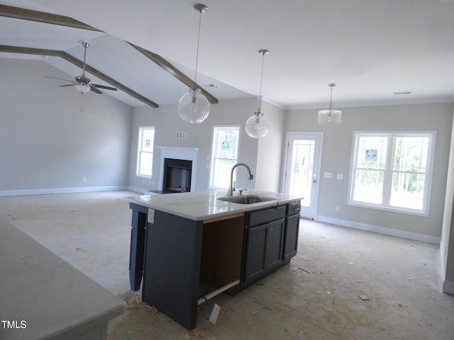 788 Shade Tree Rd, Benson, NC 27504 - kitchen featuring a sink, baseboards, a fireplace, open floor plan, and pendant lighting