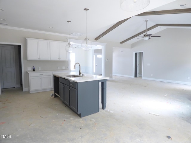 788 Shade Tree Rd, Benson, NC 27504 - kitchen featuring a sink, white cabinets, an island with sink, light countertops, and decorative light fixtures