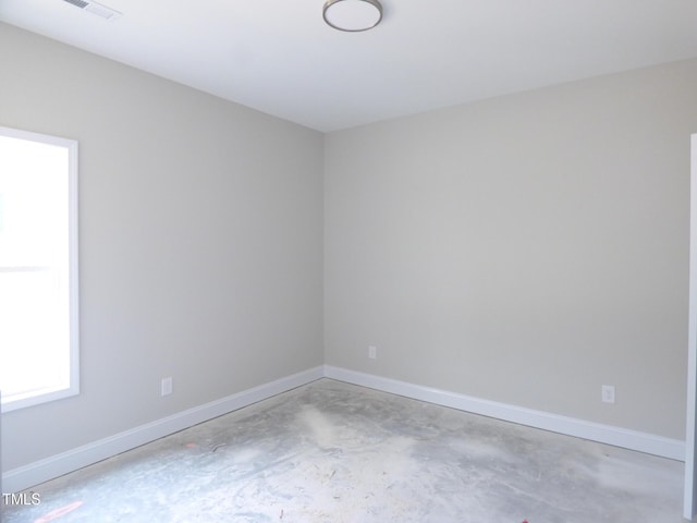 788 Shade Tree Rd, Benson, NC 27504 - spare room featuring unfinished concrete flooring and baseboards