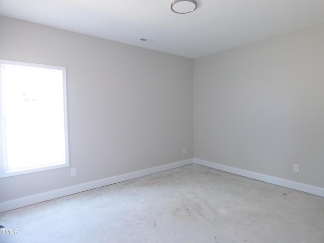 788 Shade Tree Rd, Benson, NC 27504 - unfurnished room featuring unfinished concrete floors and baseboards