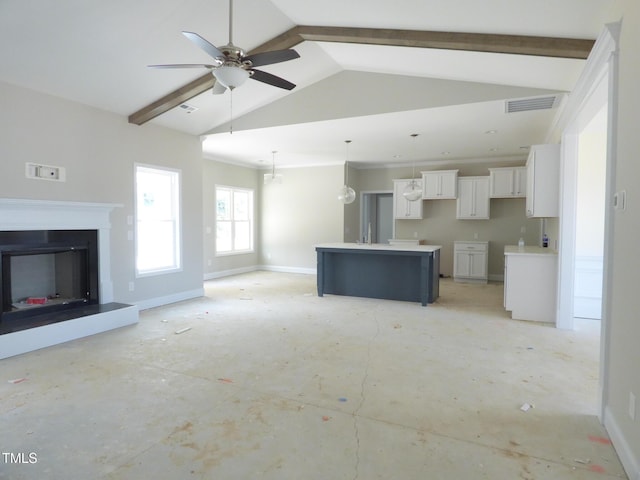 788 Shade Tree Rd, Benson, NC 27504 - unfurnished living room with a ceiling fan, vaulted ceiling, baseboards, and a fireplace with raised hearth