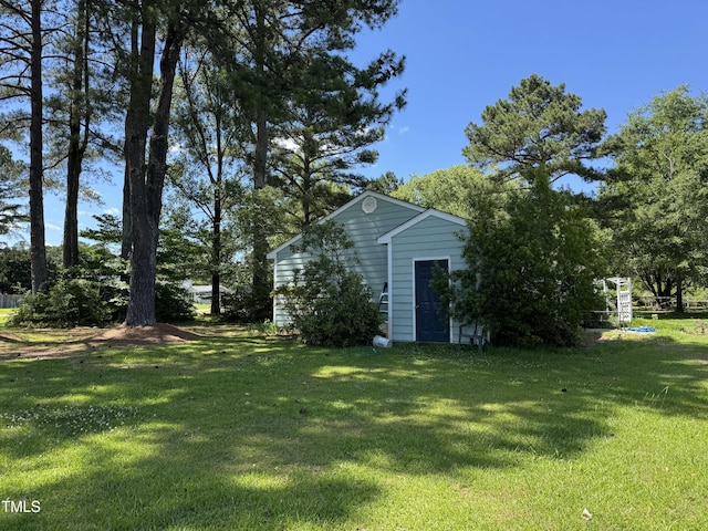 8405 Falcon Crest Cir, Angier, NC 27501 - view of grassy yard featuring an outbuilding