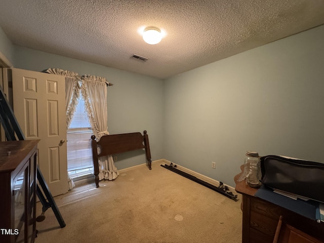 8405 Falcon Crest Cir, Angier, NC 27501 - carpeted bedroom with a textured ceiling and baseboards