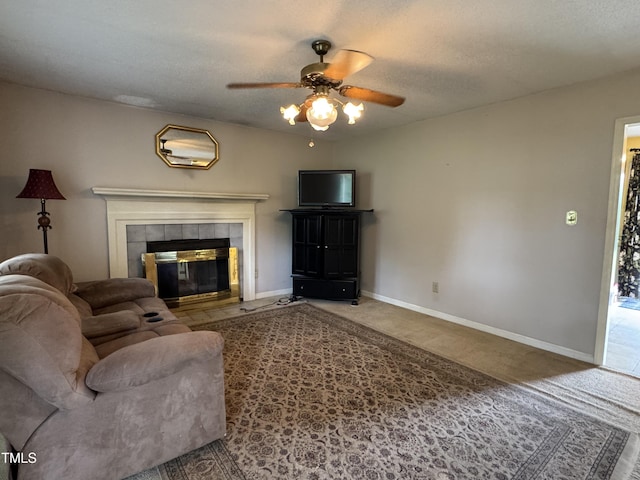 8405 Falcon Crest Cir, Angier, NC 27501 - carpeted living area with ceiling fan and a fireplace