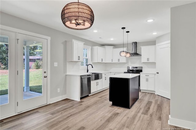 4037 Fulford Mcmillan Rd, Raeford, NC 28376 - kitchen featuring stainless steel appliances, wall chimney exhaust hood, plenty of natural light, a sink, and recessed lighting