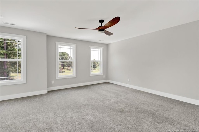 4037 Fulford Mcmillan Rd, Raeford, NC 28376 - unfurnished room with ceiling fan, plenty of natural light, baseboards, and carpet