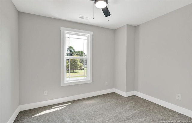 4037 Fulford Mcmillan Rd, Raeford, NC 28376 - carpeted empty room featuring plenty of natural light, baseboards, and ceiling fan