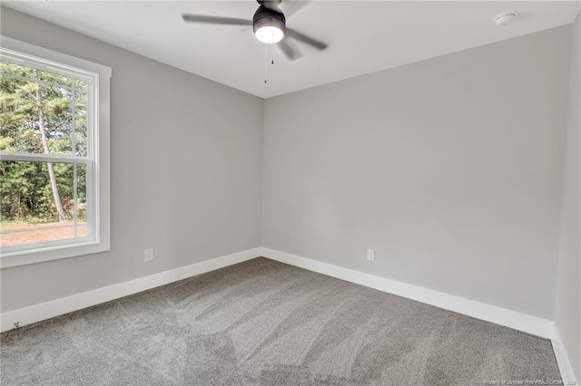 4037 Fulford Mcmillan Rd, Raeford, NC 28376 - spare room with carpet, baseboards, and a ceiling fan