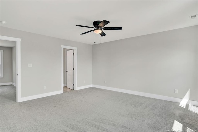 4037 Fulford Mcmillan Rd, Raeford, NC 28376 - unfurnished room featuring light colored carpet, a ceiling fan, baseboards, and a smoke detector