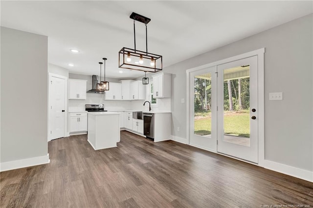 4037 Fulford Mcmillan Rd, Raeford, NC 28376 - kitchen featuring wall chimney exhaust hood, appliances with stainless steel finishes, a center island, dark wood-style floors, and recessed lighting