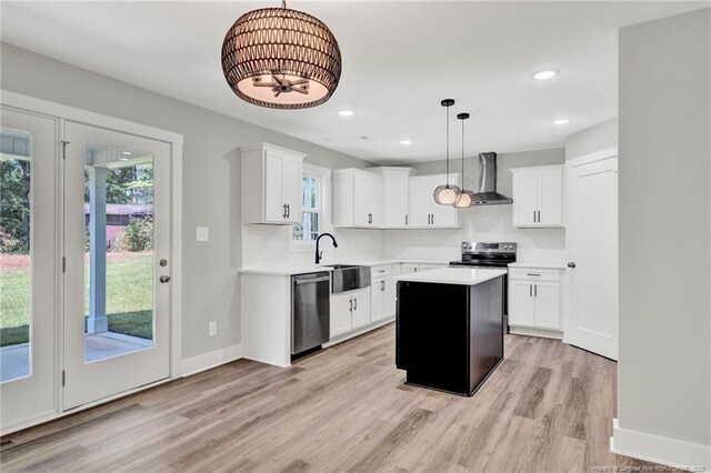 4037 Fulford Mcmillan Rd, Raeford, NC 28376 - kitchen with appliances with stainless steel finishes, wall chimney exhaust hood, healthy amount of natural light, a sink, and recessed lighting