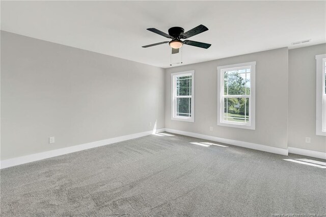 4037 Fulford Mcmillan Rd, Raeford, NC 28376 - carpeted empty room featuring baseboards and a ceiling fan
