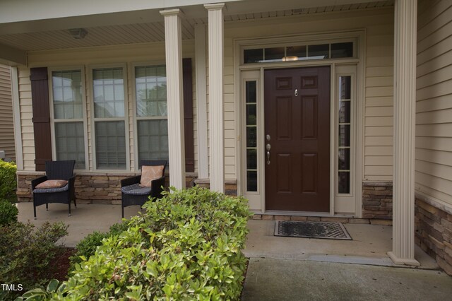 309 Forest Haven Dr, Holly Springs, NC 27540 - property entrance featuring a porch