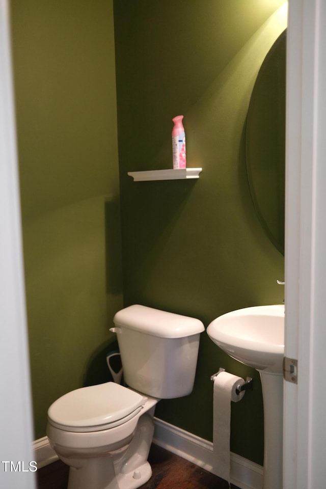 309 Forest Haven Dr, Holly Springs, NC 27540 - half bath with baseboards and toilet