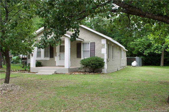 211 Sedberry St, Fayetteville, NC 28305 - view of front of property featuring covered porch and a front lawn