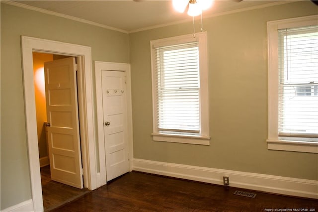211 Sedberry St, Fayetteville, NC 28305 - unfurnished room with baseboards, dark wood-style floors, ceiling fan, healthy amount of natural light, and crown molding