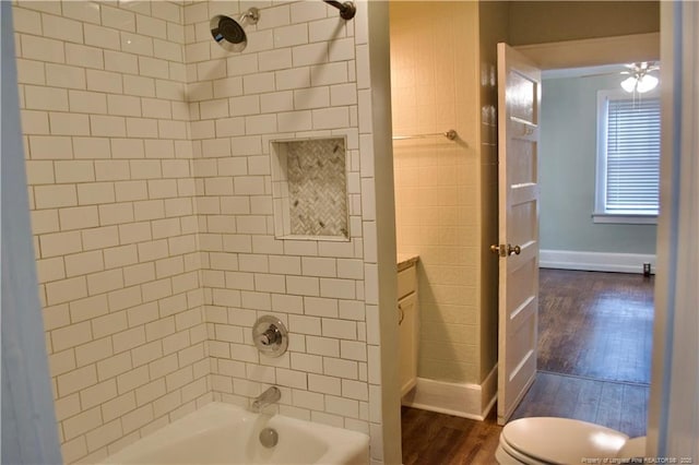 211 Sedberry St, Fayetteville, NC 28305 - full bath with wood finished floors, shower / bathtub combination, baseboards, and toilet