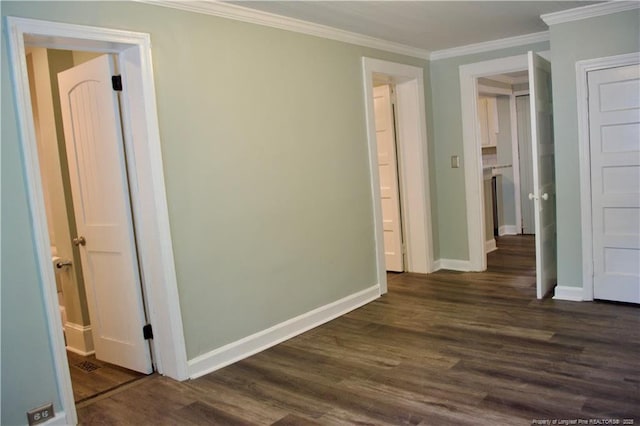 211 Sedberry St, Fayetteville, NC 28305 - unfurnished bedroom featuring baseboards, dark wood-style flooring, and ornamental molding