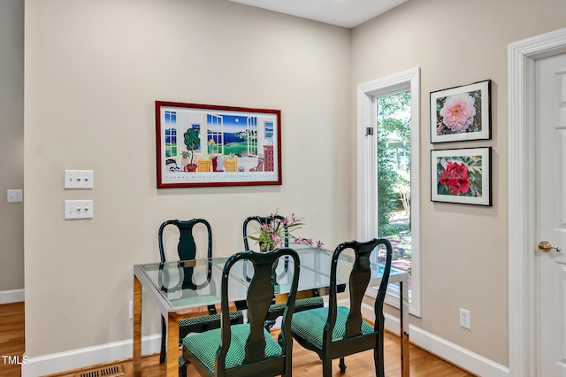 81106 Alexander, Chapel Hill, NC 27517 - dining space with light wood-style floors and an office area