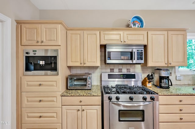 81106 Alexander, Chapel Hill, NC 27517 - kitchen featuring stainless steel appliances, light brown cabinetry, decorative backsplash, and light stone countertops