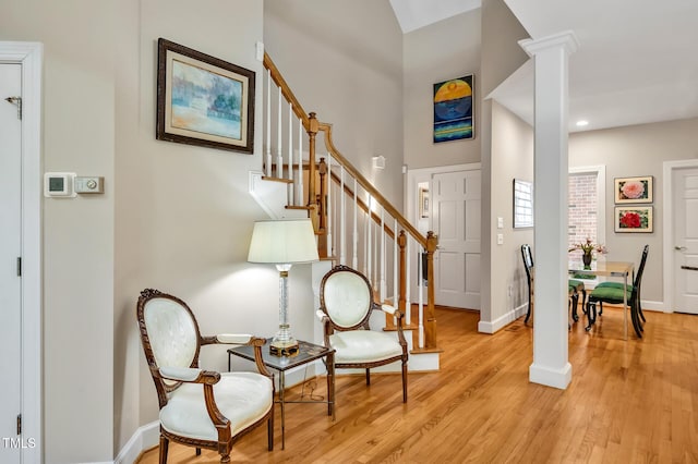 81106 Alexander, Chapel Hill, NC 27517 - entrance foyer featuring decorative columns, stairs, light wood finished floors, and recessed lighting