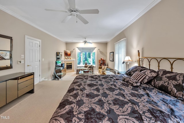 81106 Alexander, Chapel Hill, NC 27517 - carpeted bedroom featuring ornamental molding, a tile fireplace, and a ceiling fan