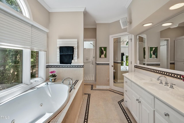 81106 Alexander, Chapel Hill, NC 27517 - bathroom featuring healthy amount of natural light, ornamental molding, a jetted tub, vanity, and a shower stall