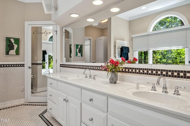 81106 Alexander, Chapel Hill, NC 27517 - full bath featuring double vanity, tile patterned floors, recessed lighting, and crown molding