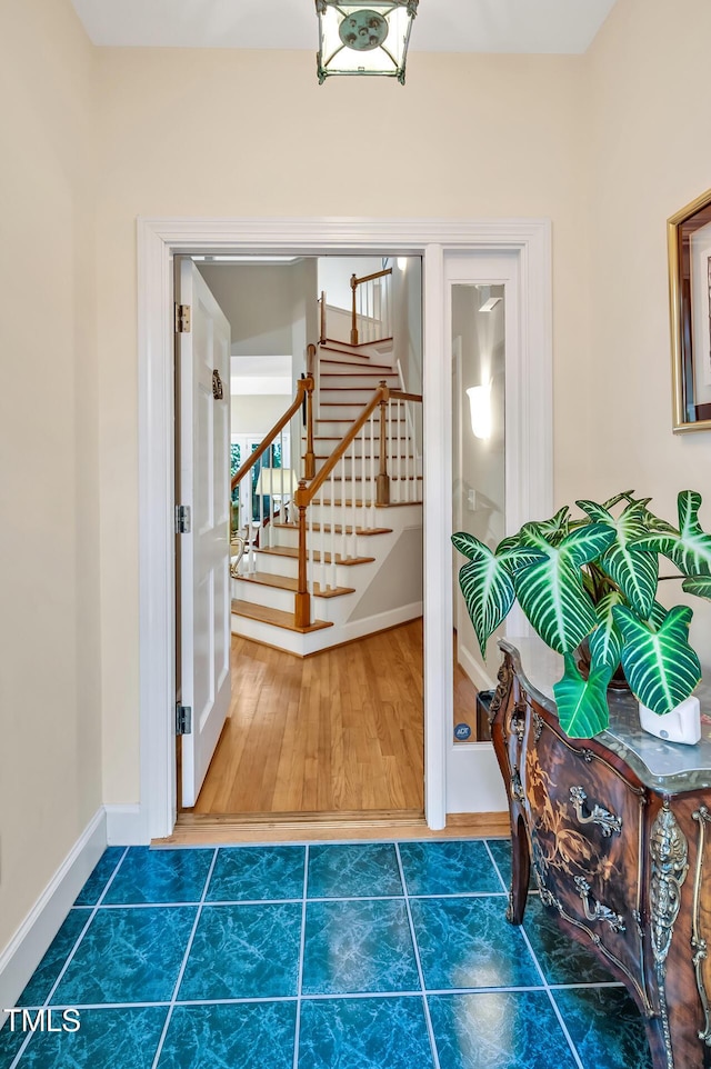 81106 Alexander, Chapel Hill, NC 27517 - staircase with baseboards and wood finished floors