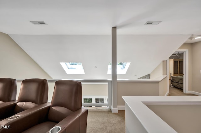 81106 Alexander, Chapel Hill, NC 27517 - carpeted home theater featuring a skylight and lofted ceiling