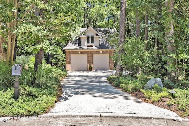 81106 Alexander, Chapel Hill, NC 27517 - view of front facade featuring brick siding and driveway