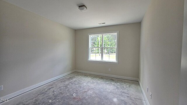 109 Drew St, Louisburg, NC 27549 - unfurnished room featuring unfinished concrete flooring and baseboards