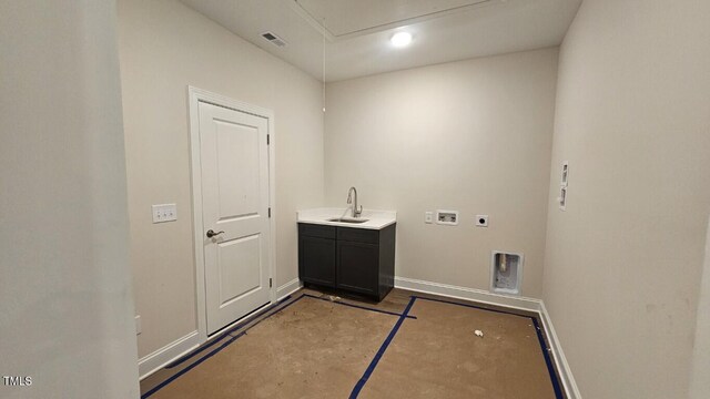 109 Drew St, Louisburg, NC 27549 - washroom with electric dryer hookup, hookup for a washing machine, cabinet space, baseboards, and attic access