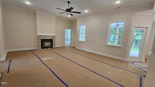 109 Drew St, Louisburg, NC 27549 - unfurnished living room featuring baseboards, plenty of natural light, recessed lighting, a fireplace, and ceiling fan