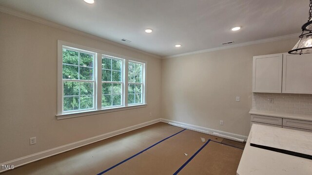 109 Drew St, Louisburg, NC 27549 - unfurnished dining area featuring baseboards, recessed lighting, and crown molding