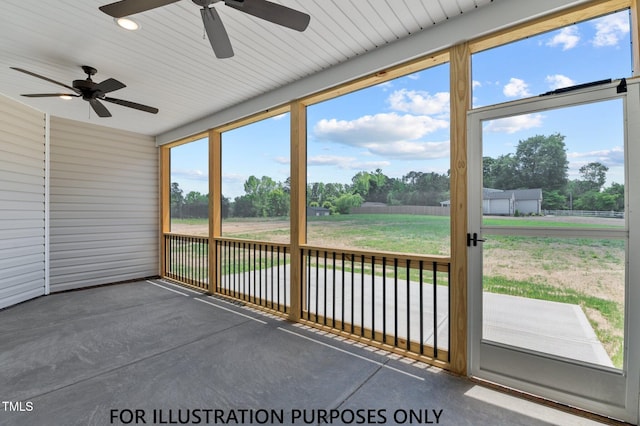 109 Drew St, Louisburg, NC 27549 - unfurnished sunroom featuring a ceiling fan and view of wooded area